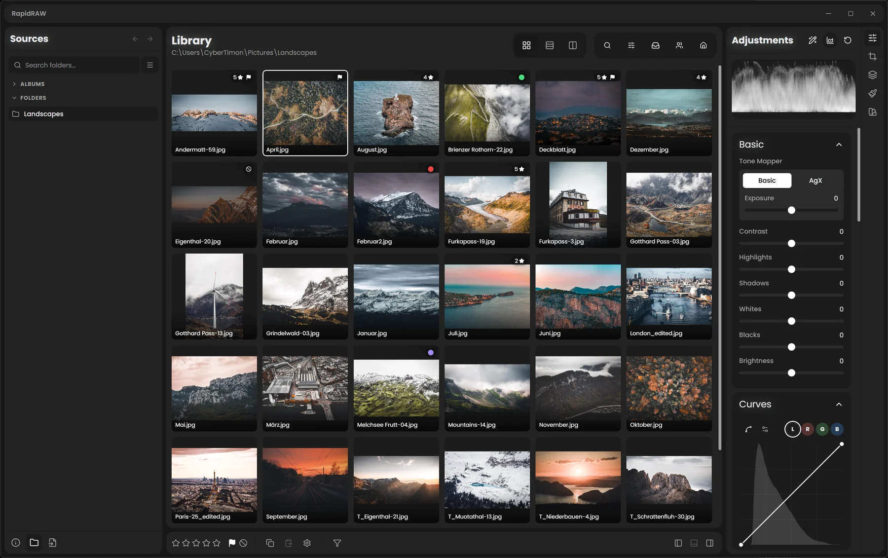 RapidRAW library view with side panels and a thumbnail grid