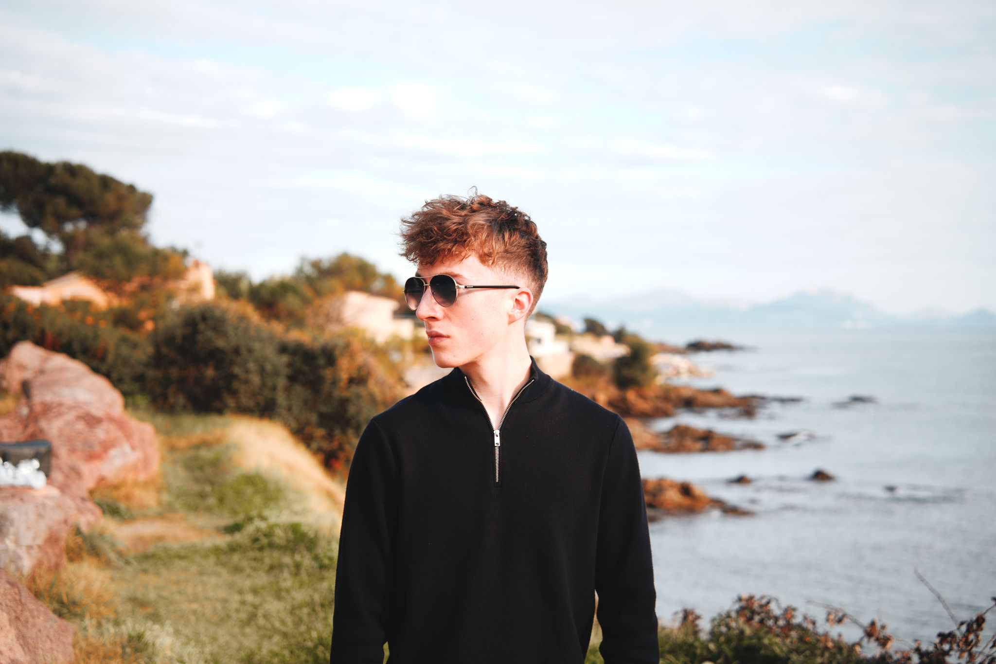 Finished portrait: subject pops, warm skin tones, softened background