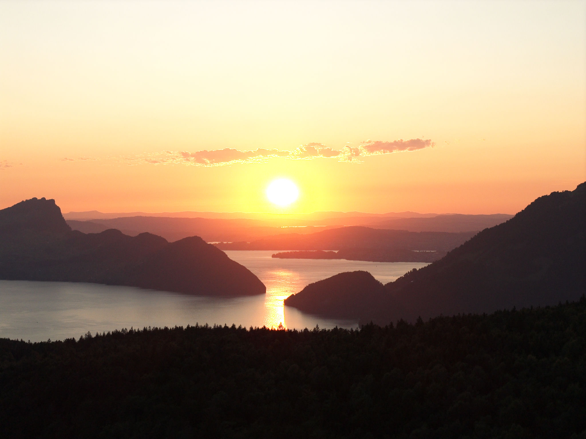 Original RAW: a sunset landscape with a blown sky and dark foreground